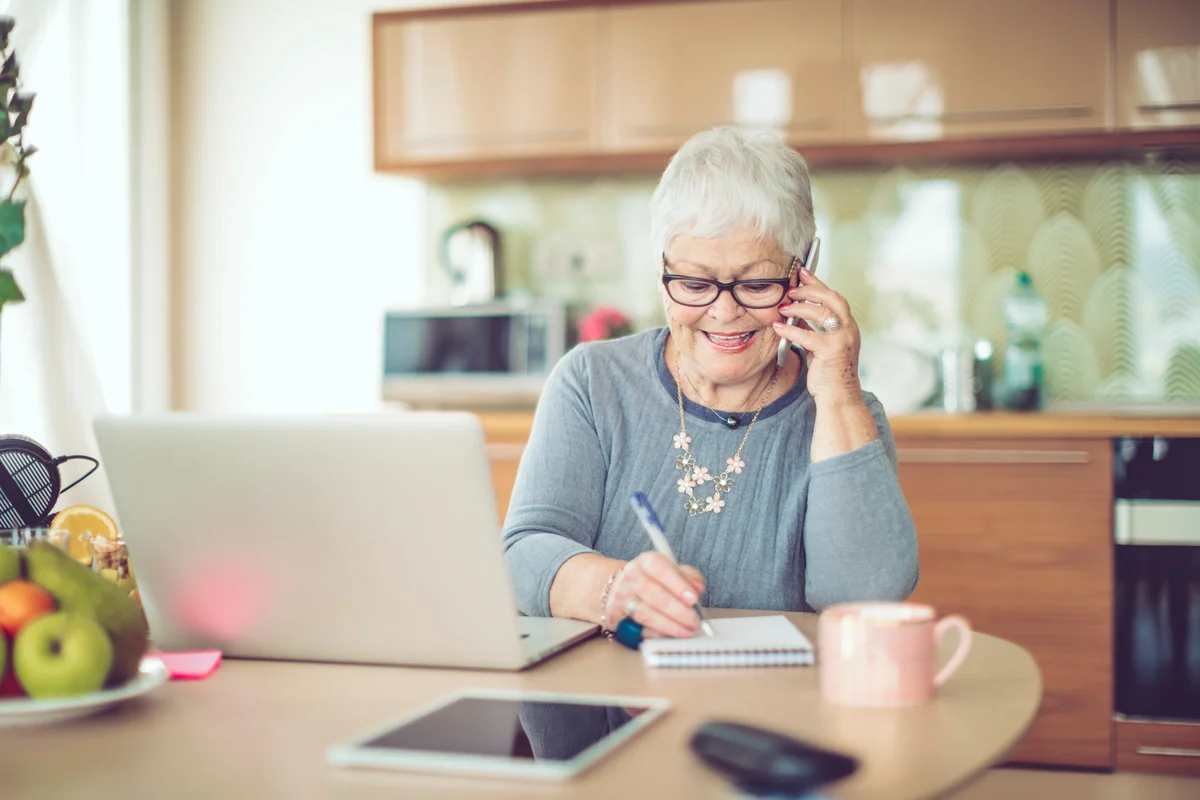 Senior woman working from home