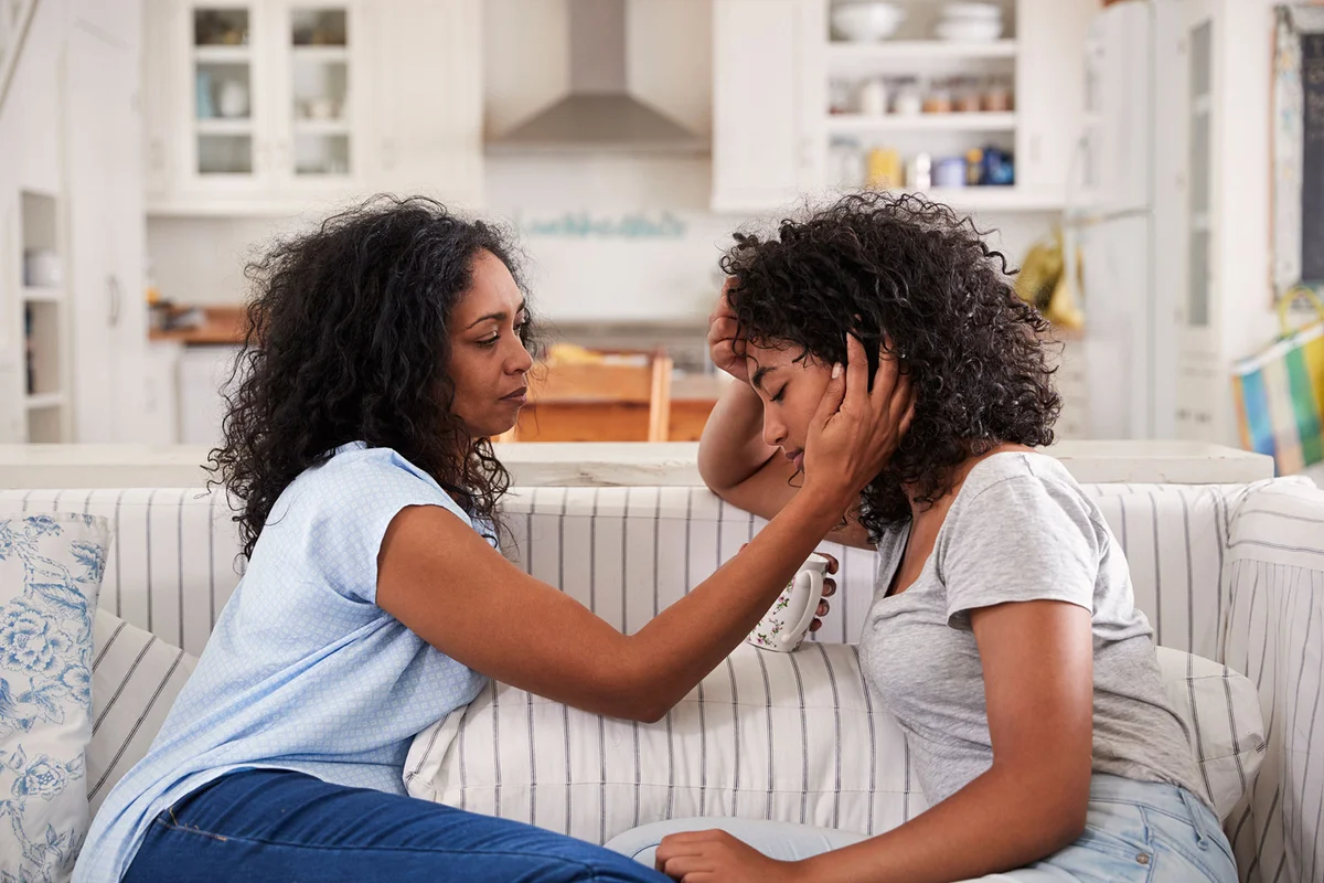 Mother talking with her teen daughter
