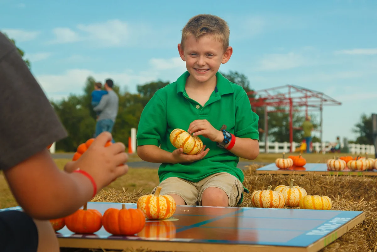 Boys playing halloween tac tac toe