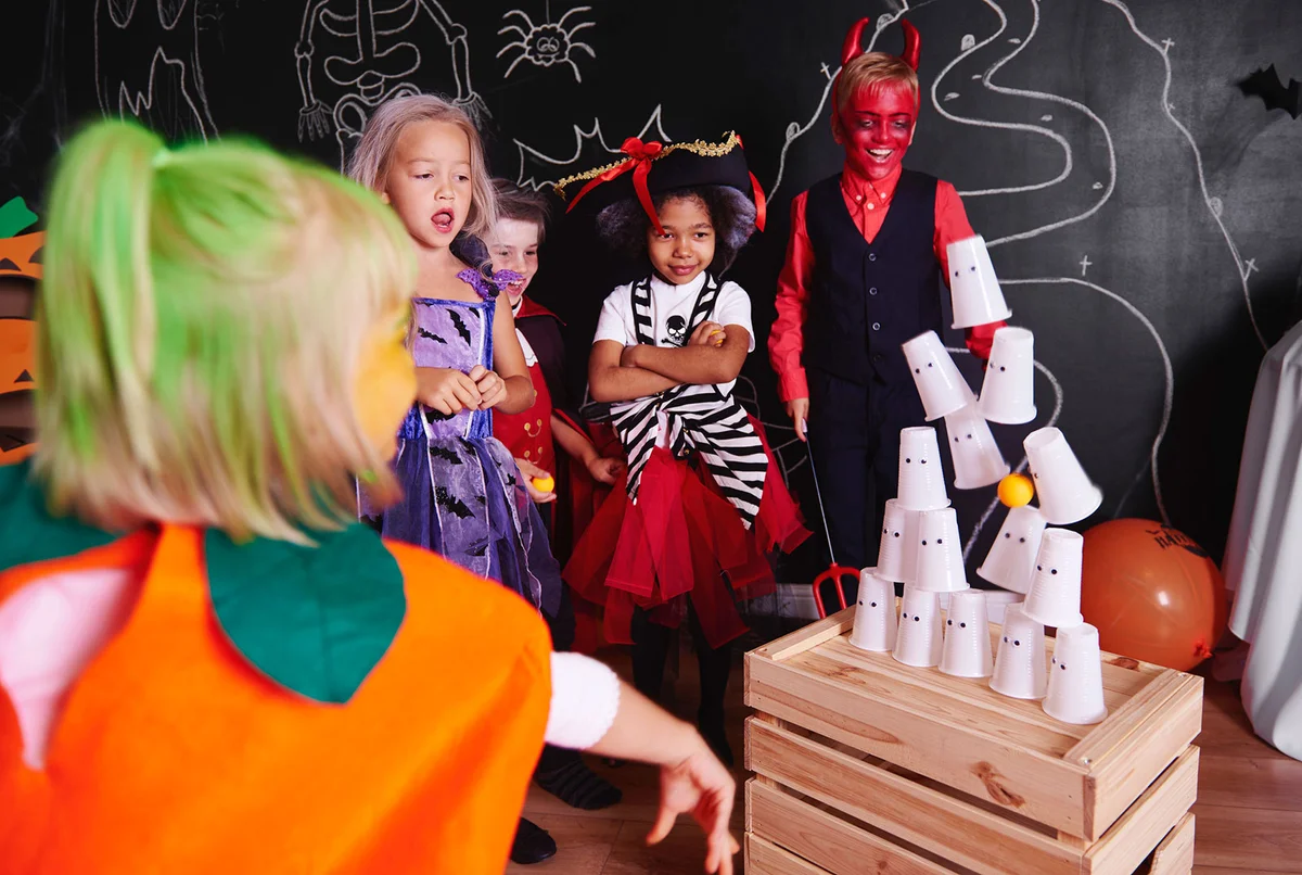 Kids playing a halloween party game