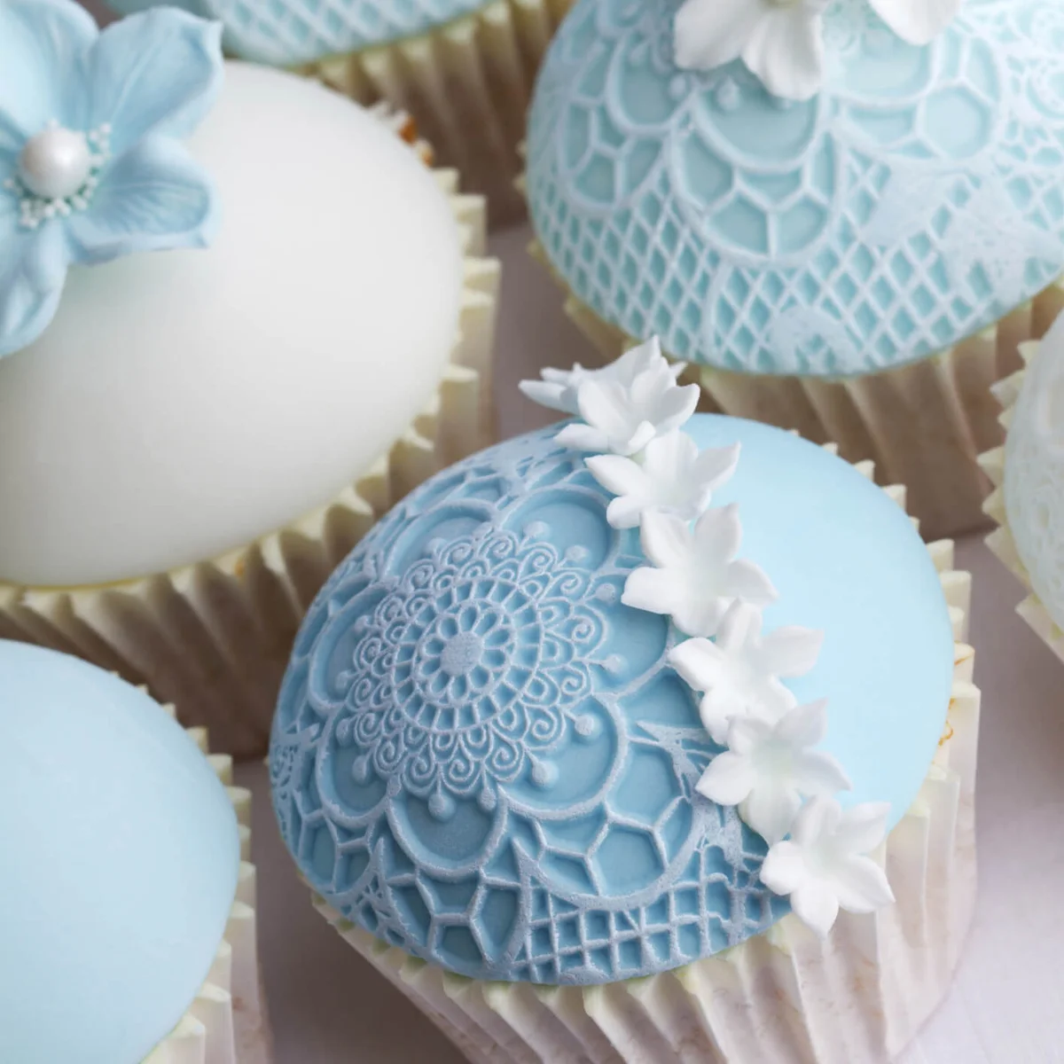 Blue lace wedding cupcakes