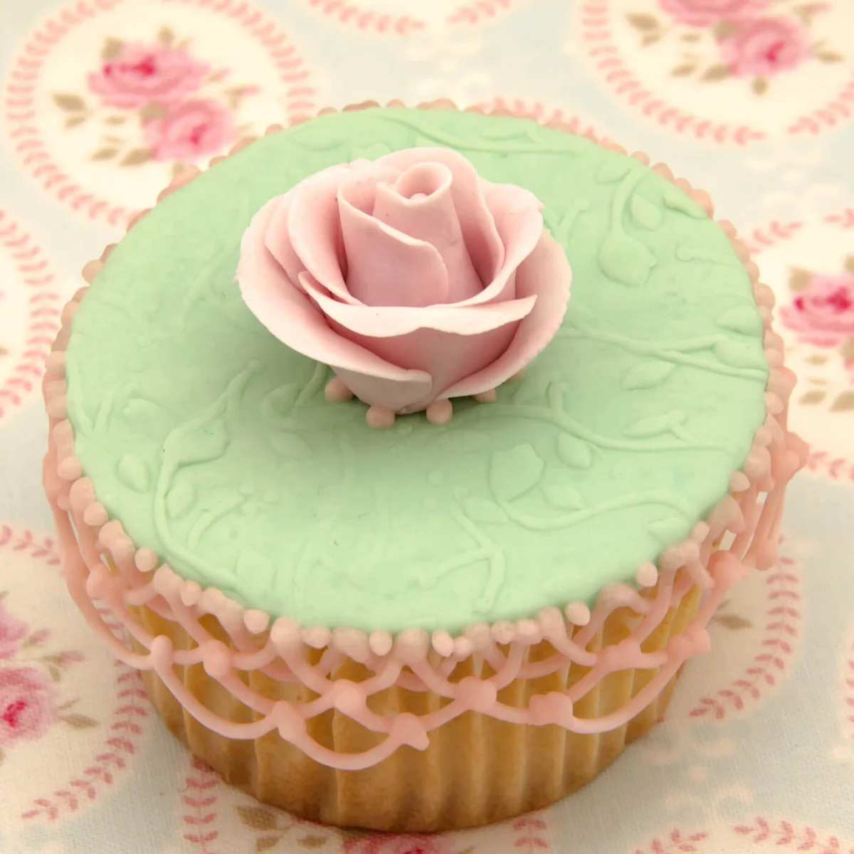 Pink lattice and rose wedding cupcake