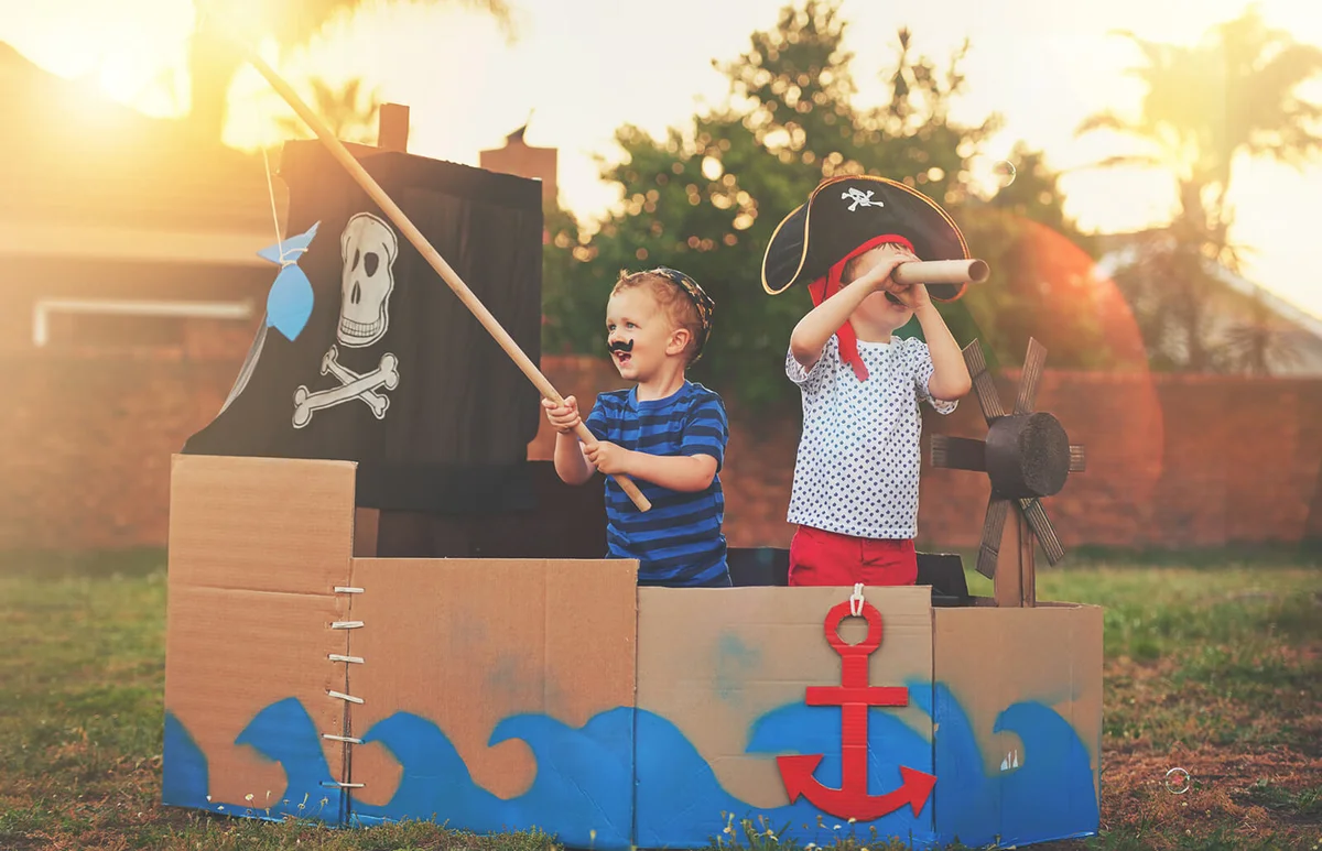 cute little boys playing pirates