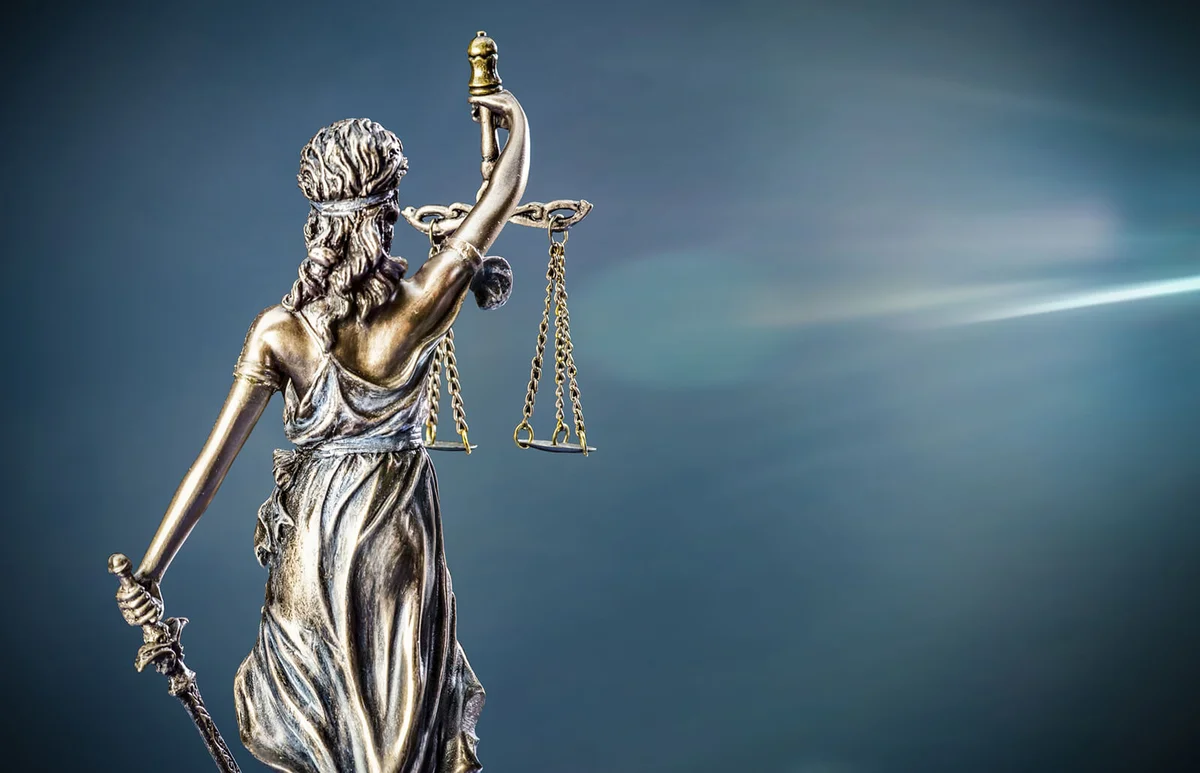 Low Angle View Of Lady Justice Against Sky