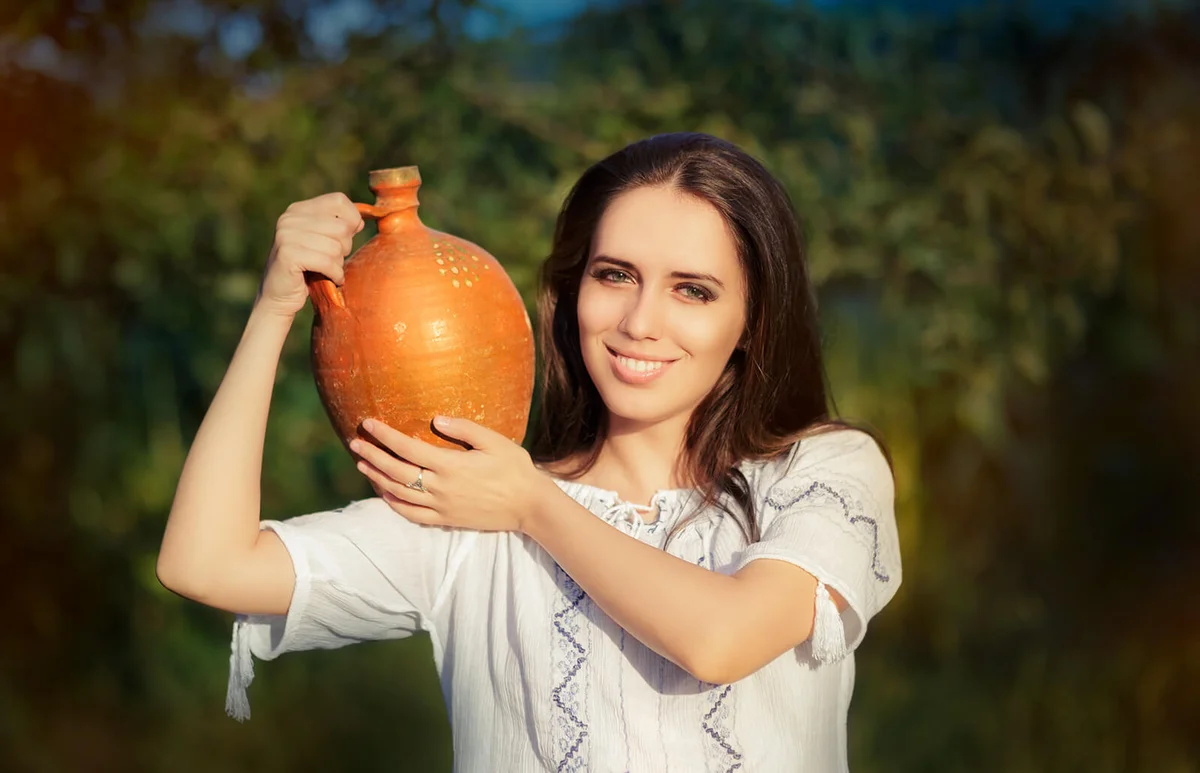 Young Woman with Clay Pitcher