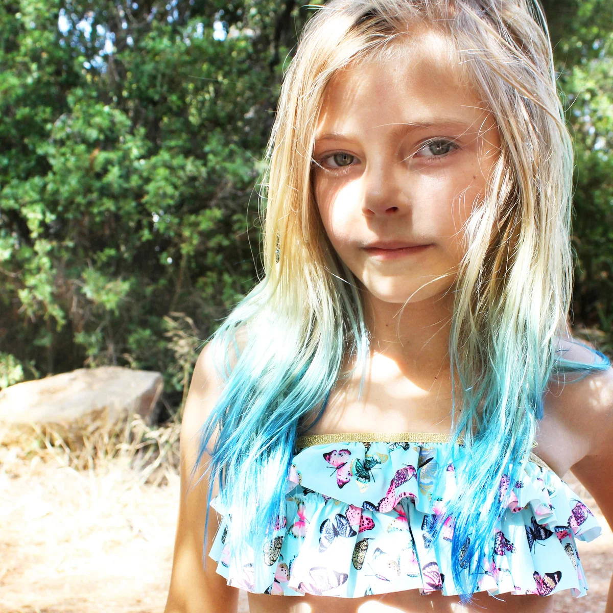 Girl With Dyed Hair Standing At Park