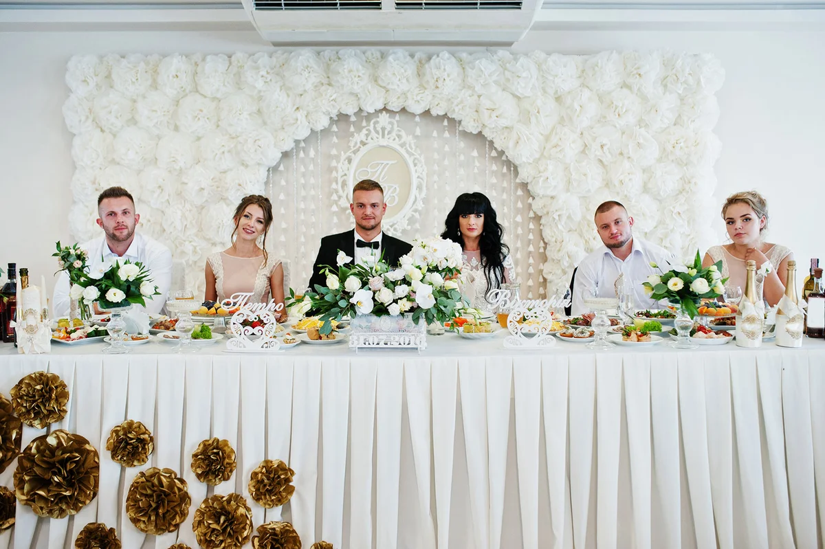 Wedding couple with best man and bridesmaid