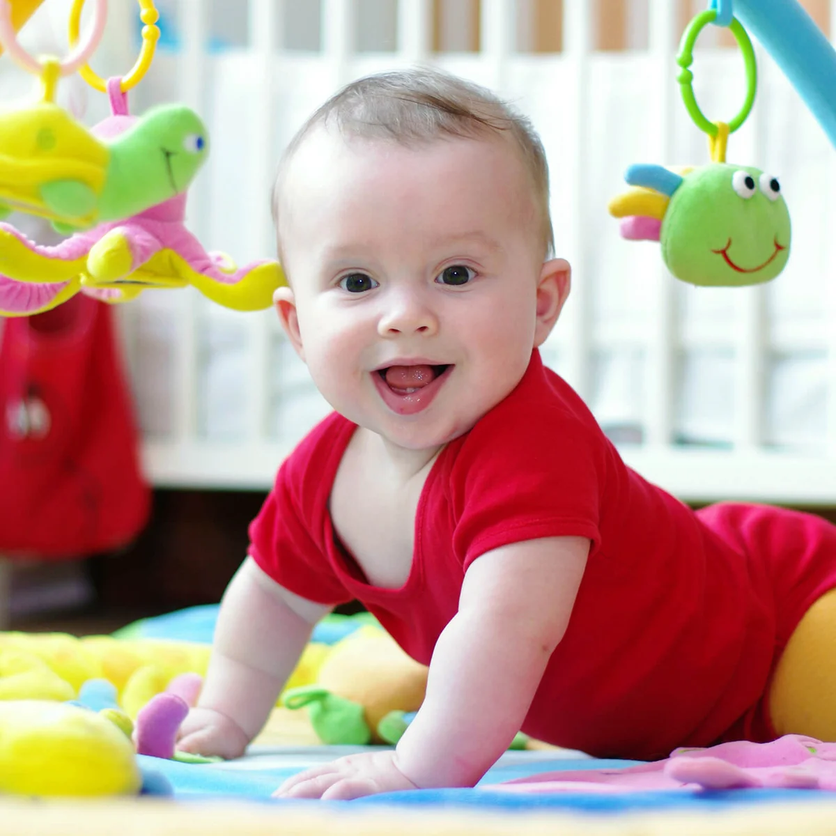 Baby age of 6 months on playmat