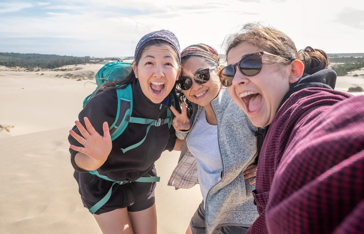 Girls Taking Selfie on Dunes