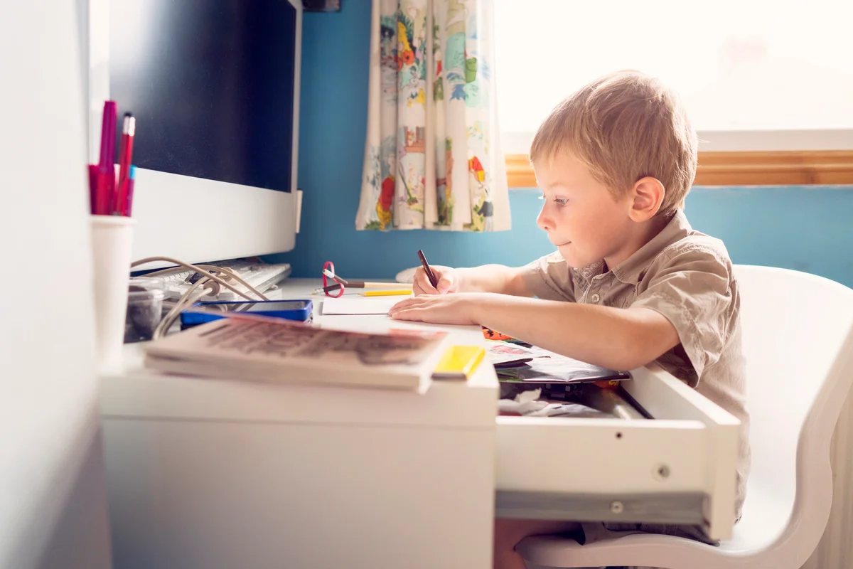 Young boy doing his homework
