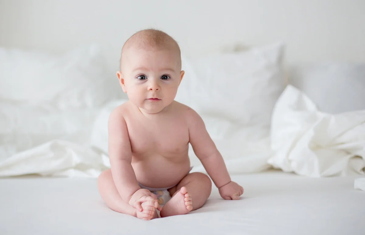 Cute little baby boy in diaper