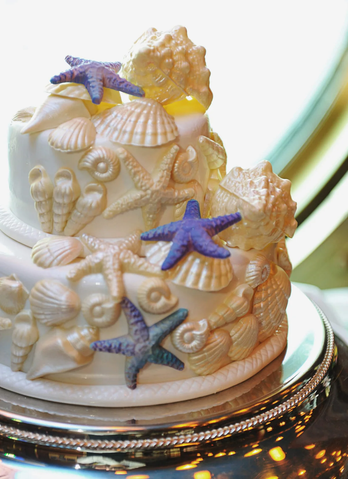 wedding cake with sea shells