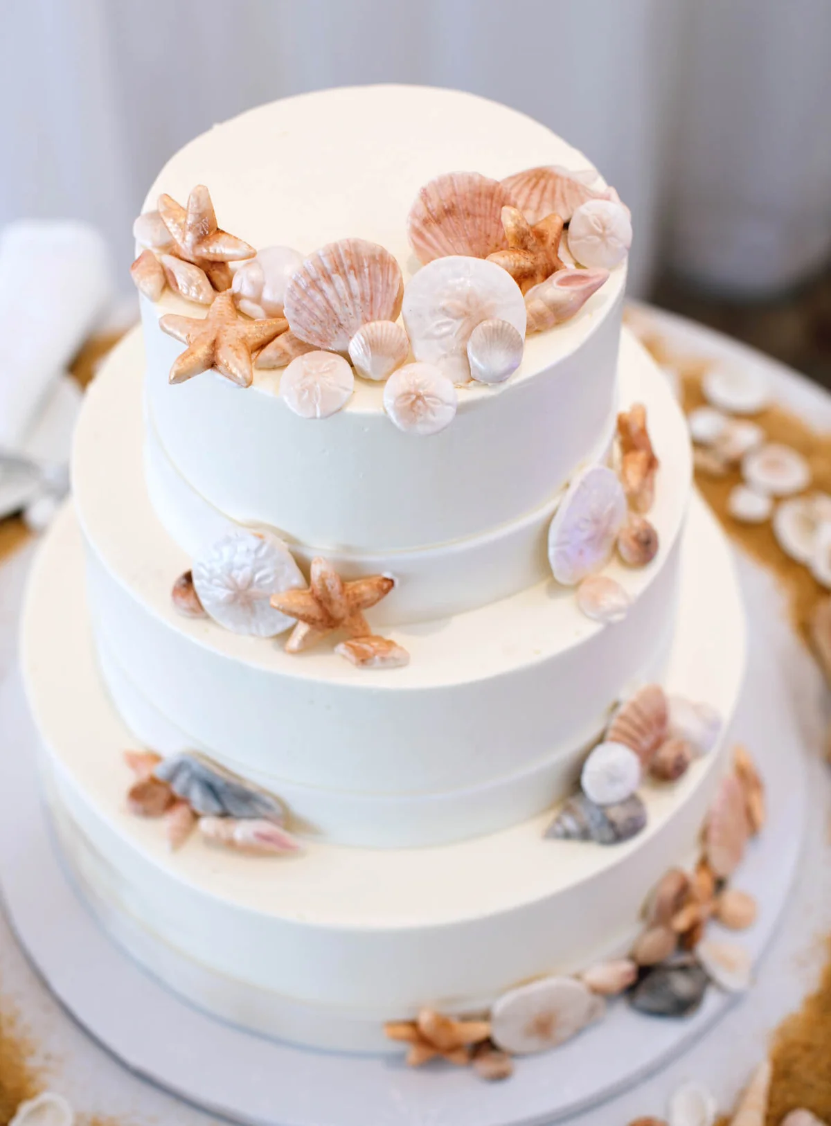 White Wedding Cake with Beach Decor