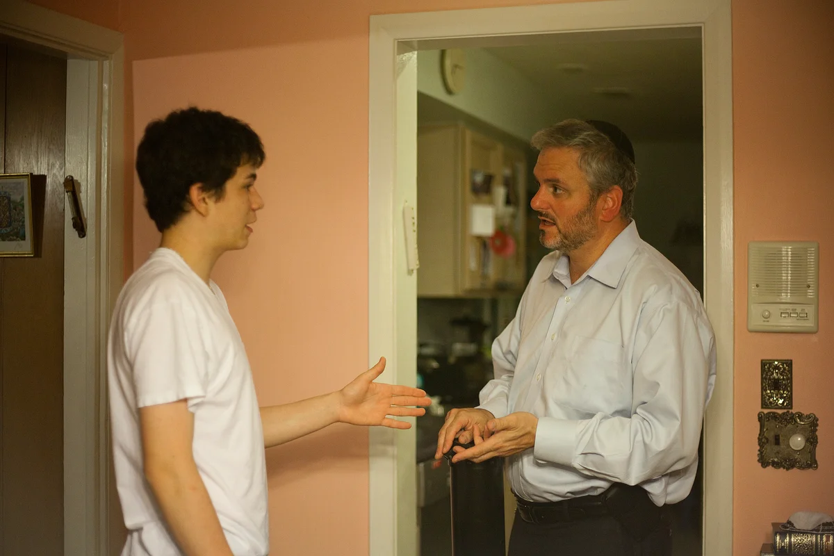 Father and teen son arguing