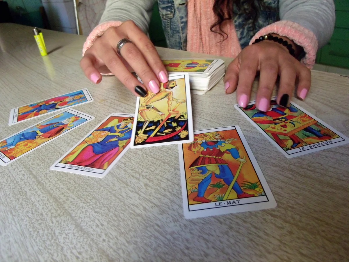 Woman with tarot spread