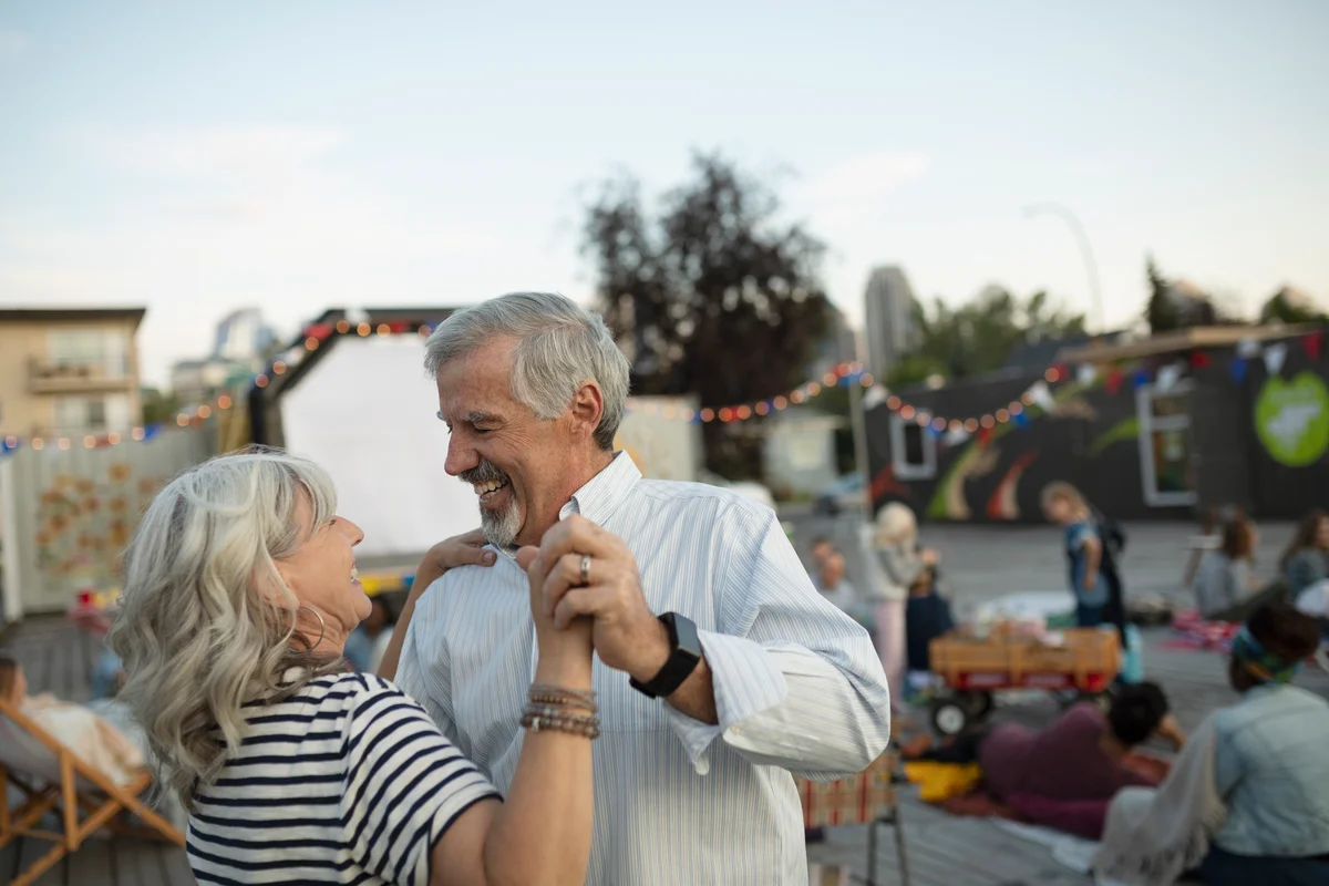 Older couple dancing together