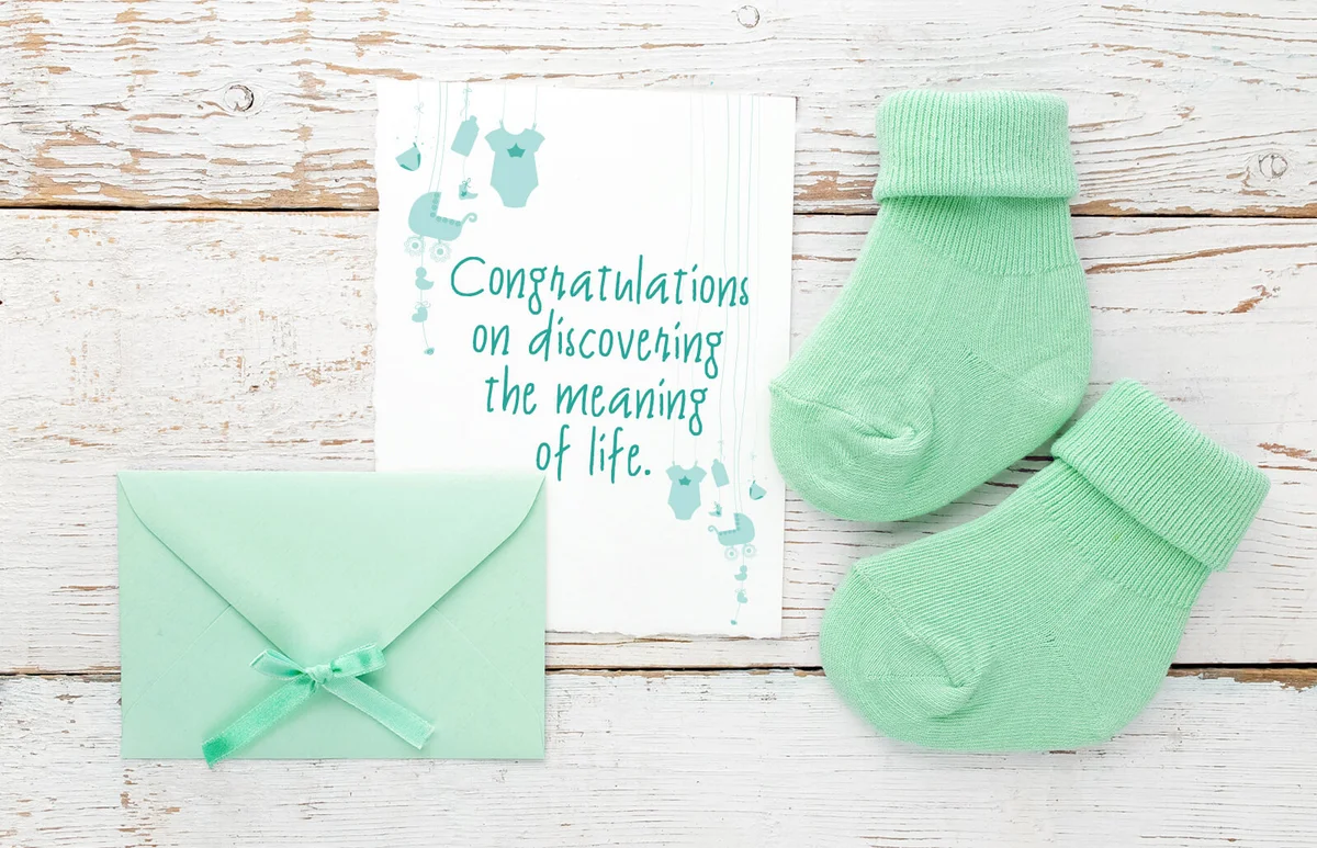 New baby card with small socks