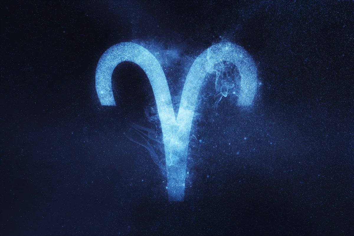 Aries symbol on black background