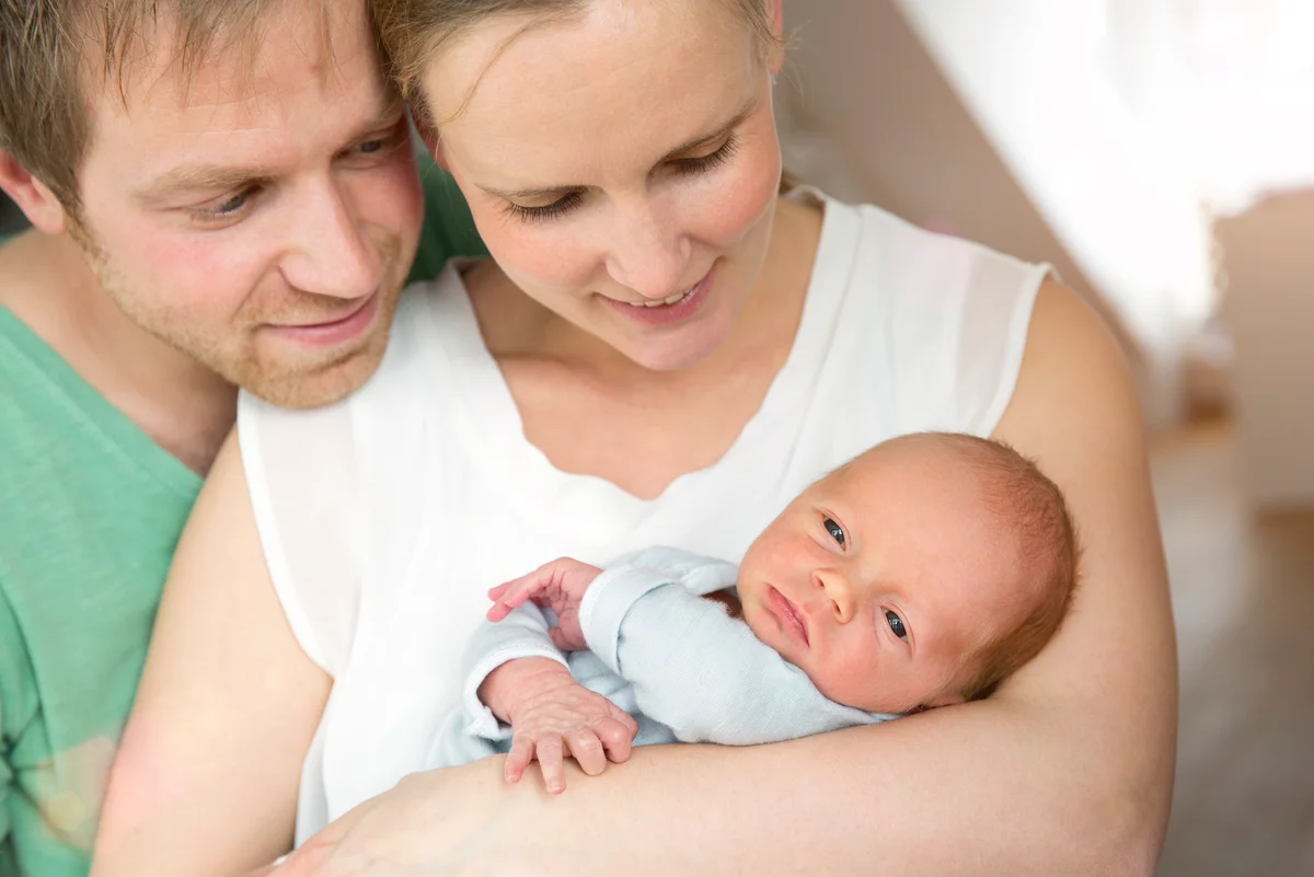 Parents with newborn baby