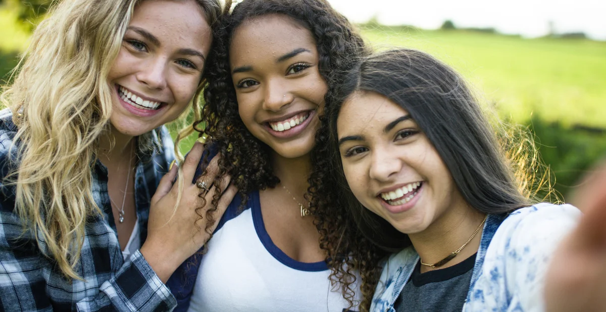 Selfie of three friends