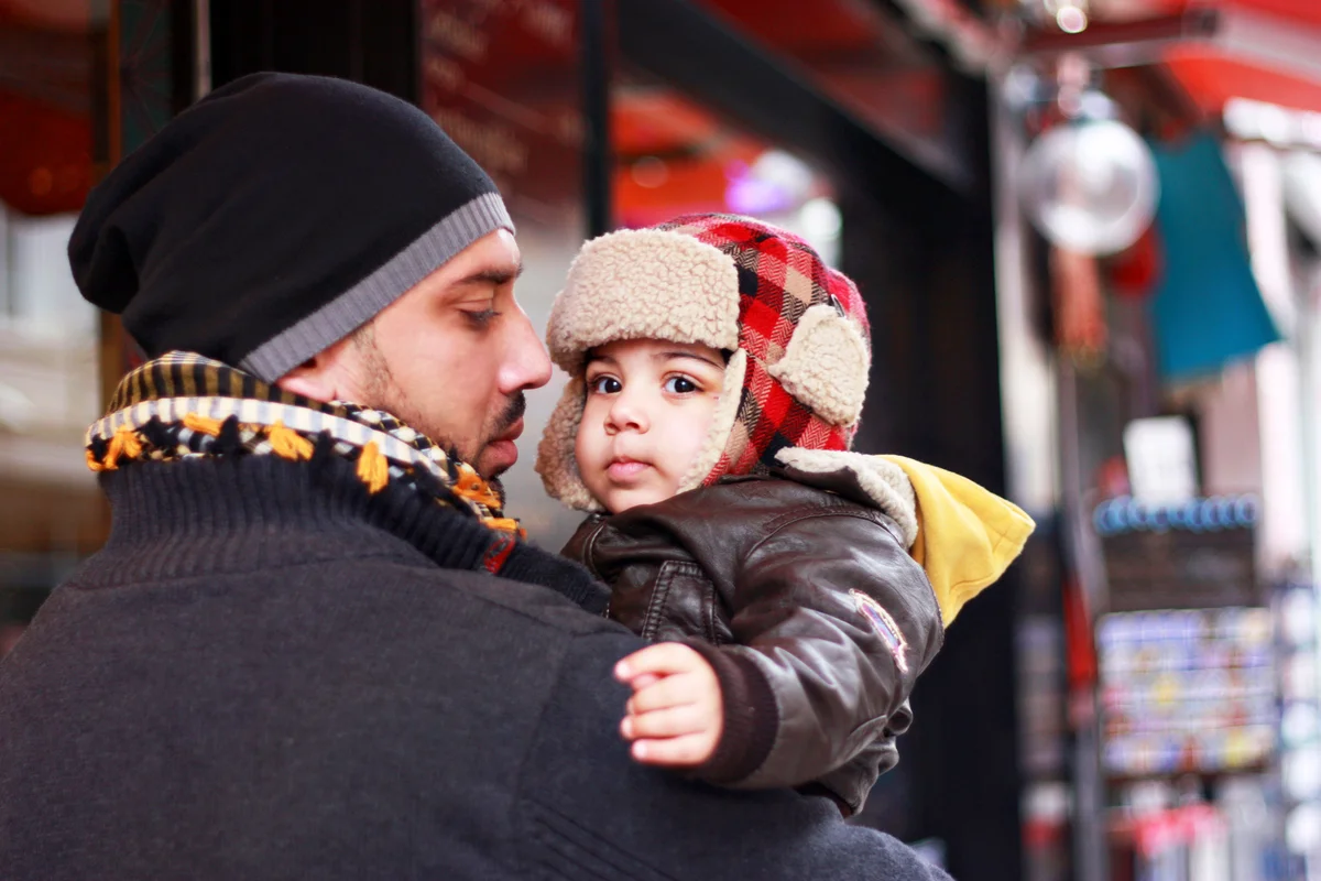 Dad holding baby boy