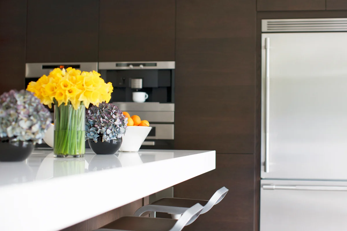 Yellow flowers in modern kitchen