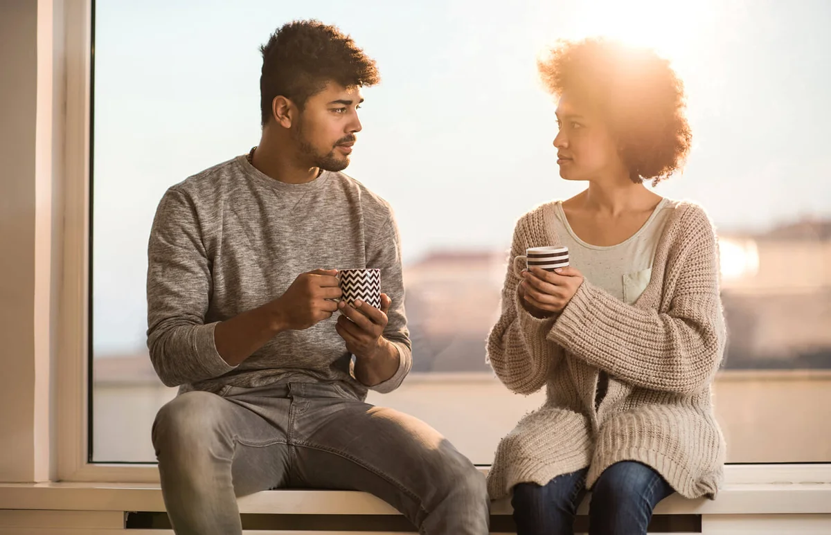 couple talking to each other during coffee time