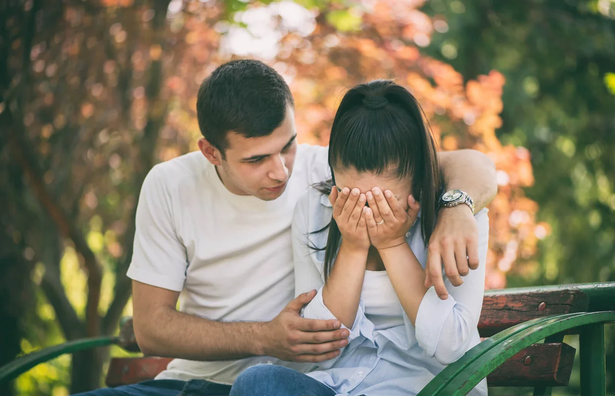 Young man supporting his girlfriend