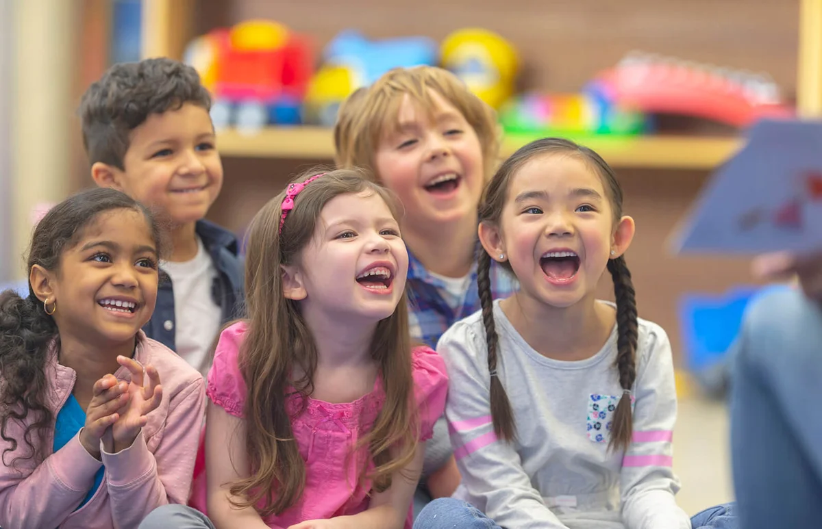 Group of little kids in classroom for seek and find