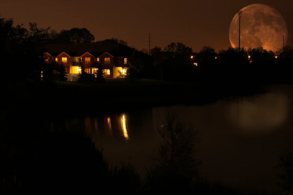 Full moon over a house