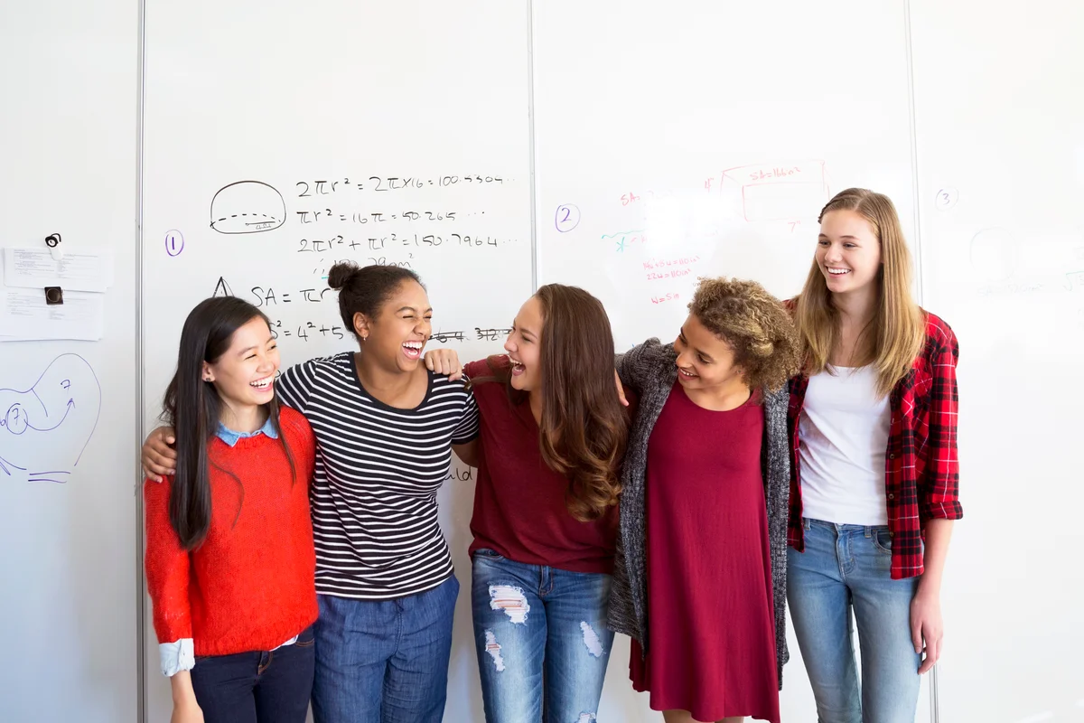 Female high school students a row classroom