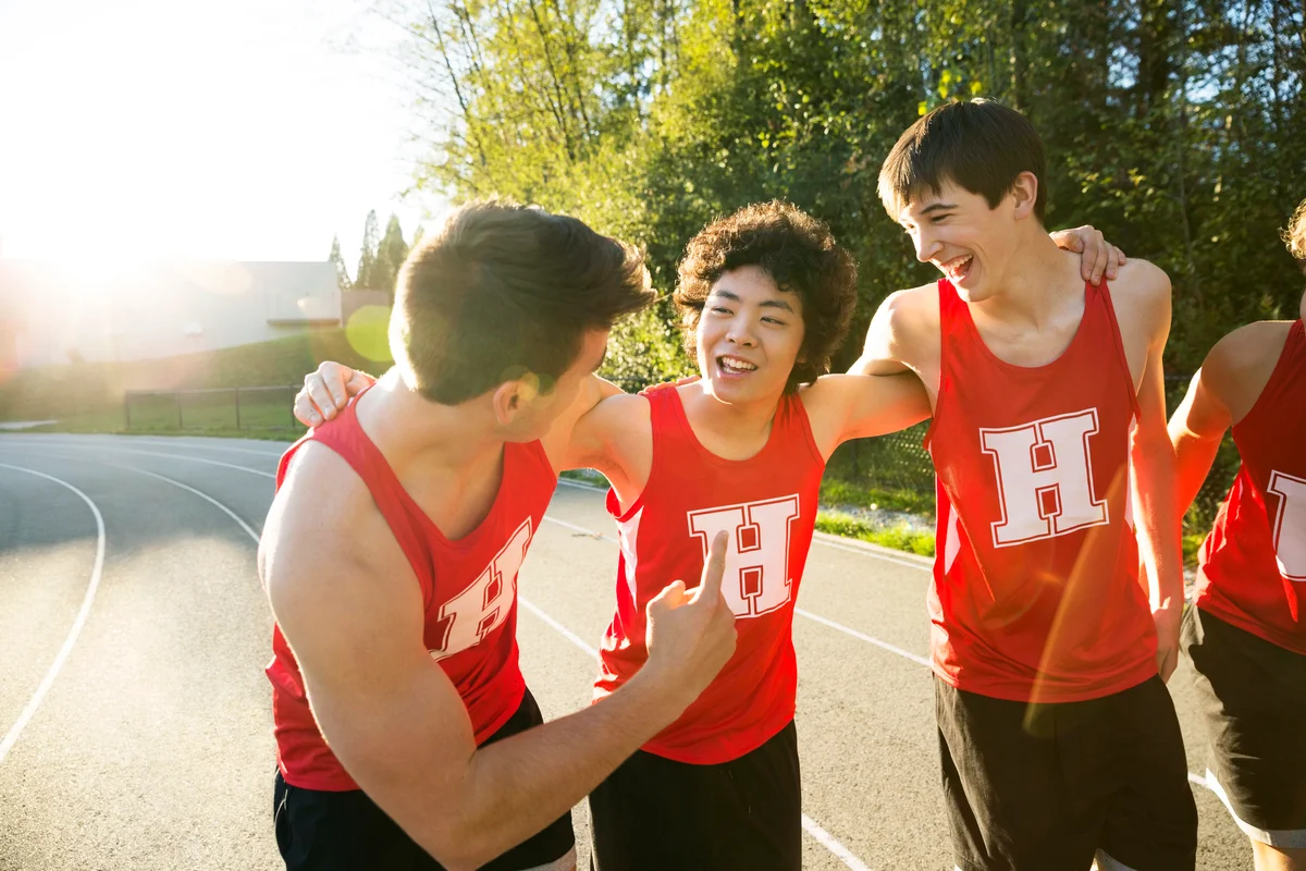 High school track and field athletes bonding