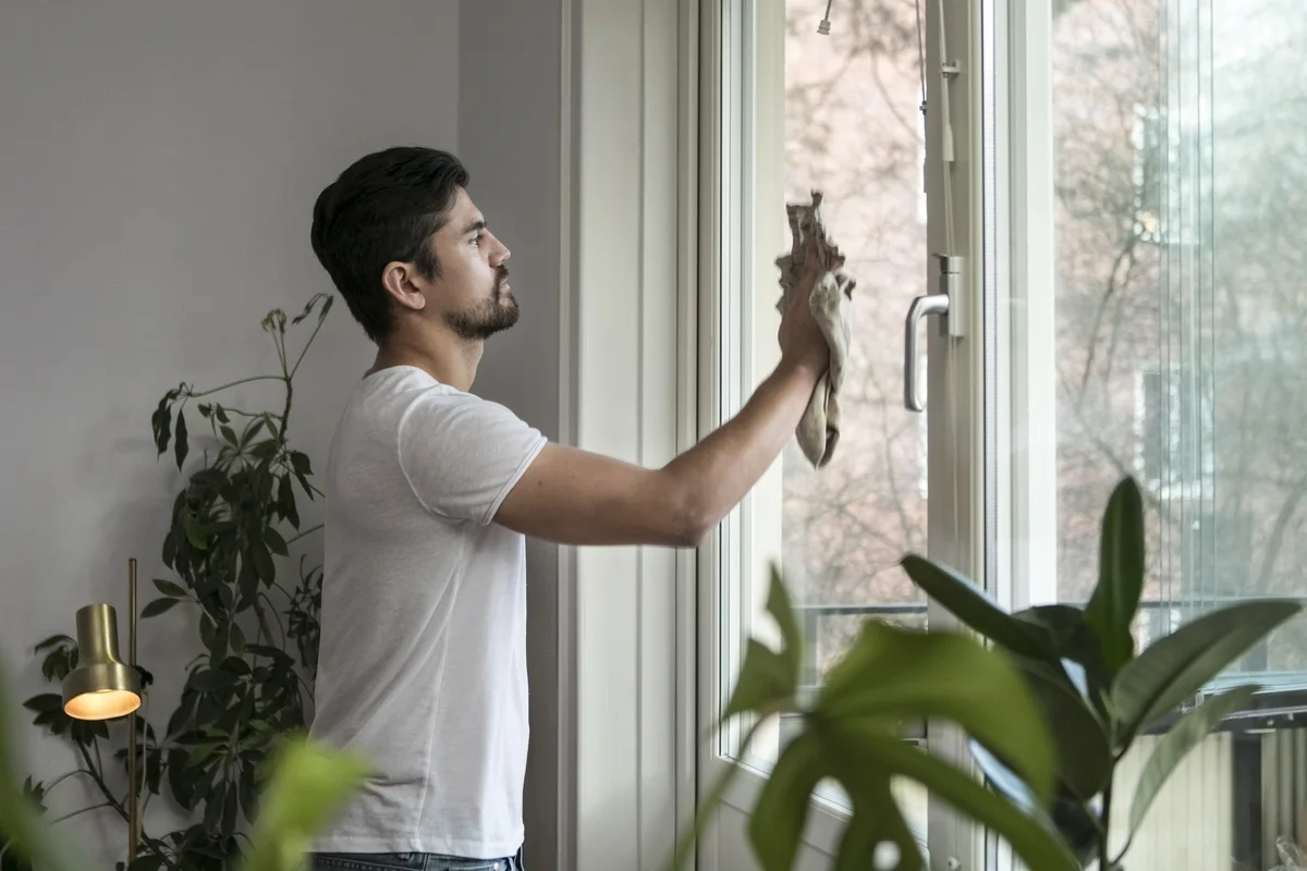 Man washing a window