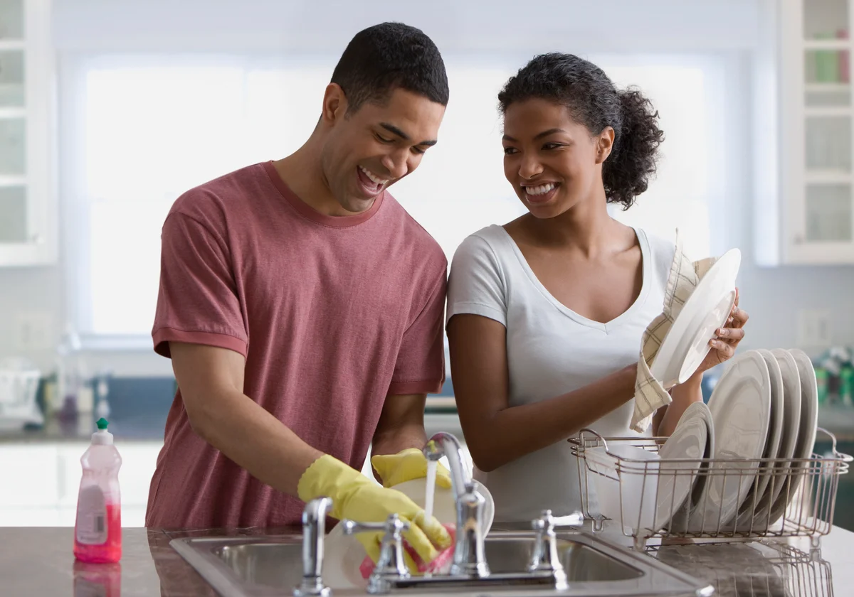 Couple washing the dishes