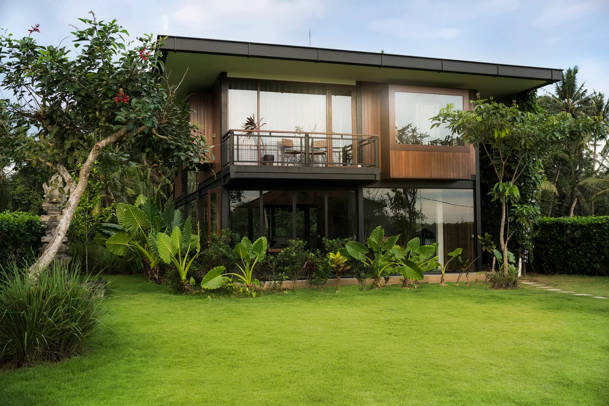 House with bushes and trees