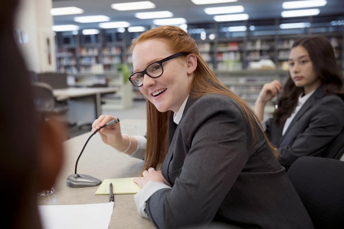 Student in debate club library
