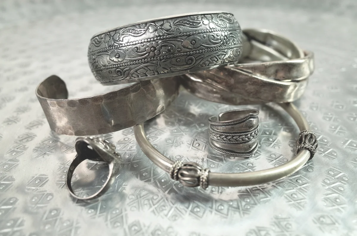 Silver bracelets and rings