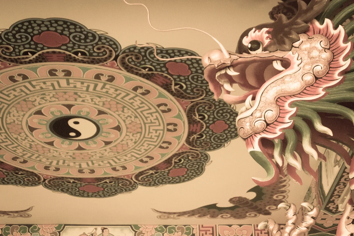 Yin, yang, and dragon on a temple ceiling