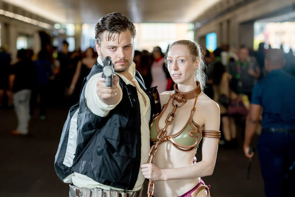 Fans cosplay as Han Solo and Princess Leia form Star Wars