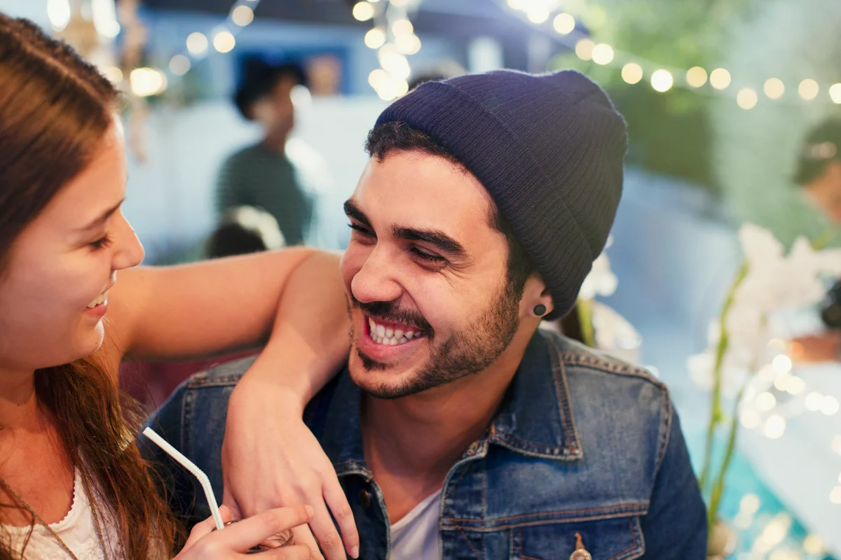 Couple laughing at each other