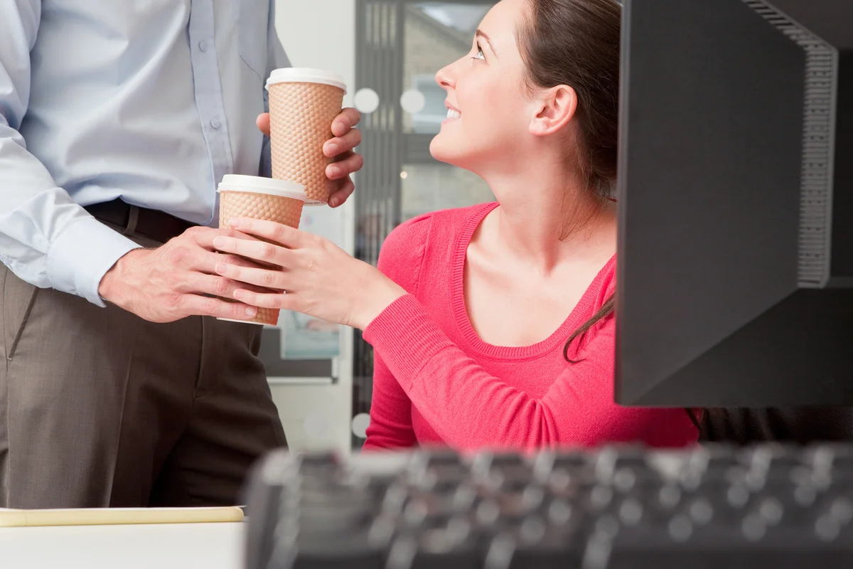 Colleague bringing coffee