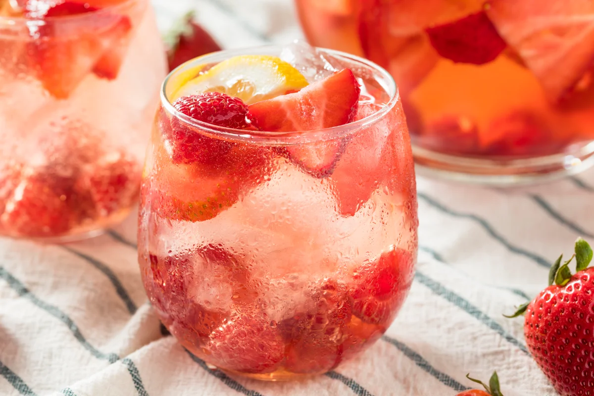 Pink Champagne punch with berries