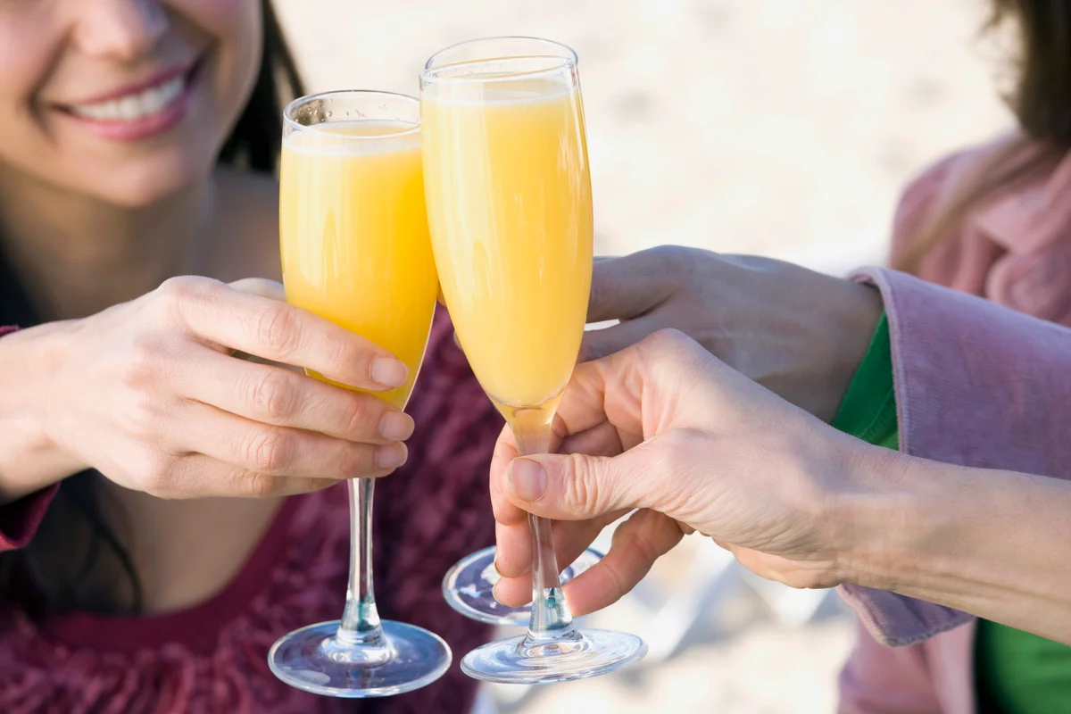 Toasting with mimosas