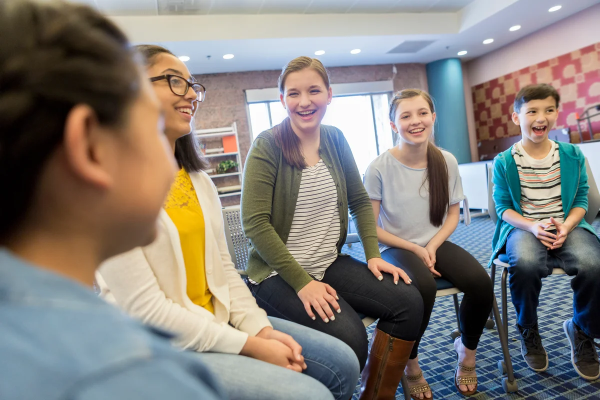 Laughing group of middle school kids
