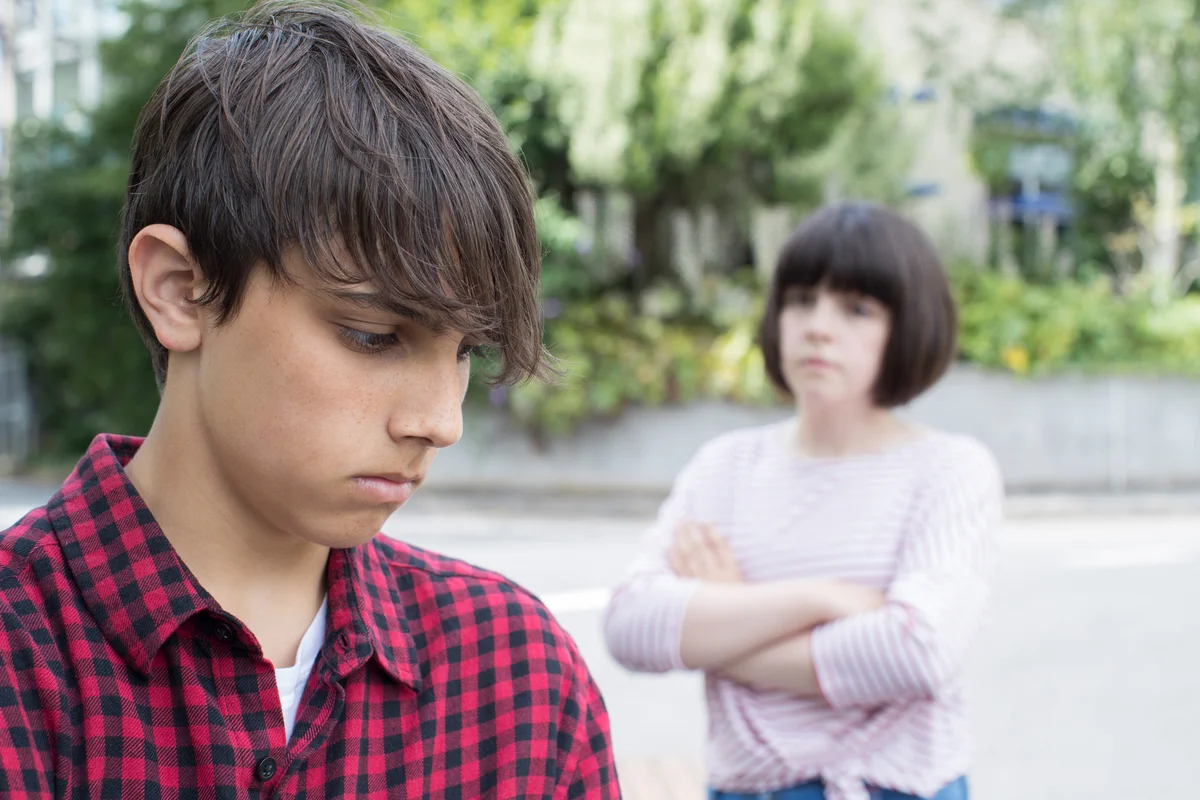 Unhappy young teen couple