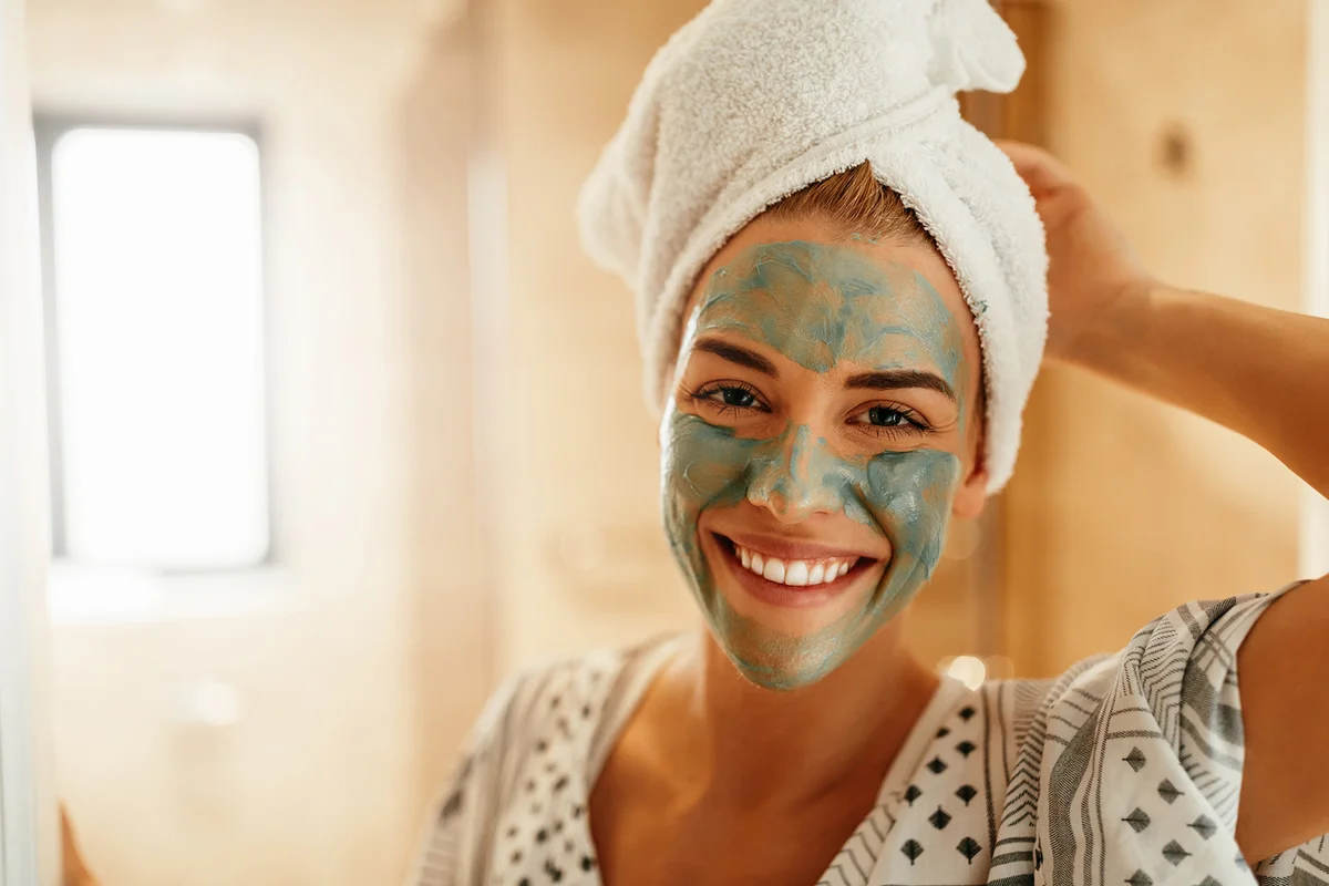 Girl wearing facial beauty mask