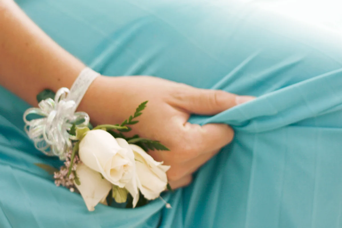 Ready for prom - close up of a hand with a corsage