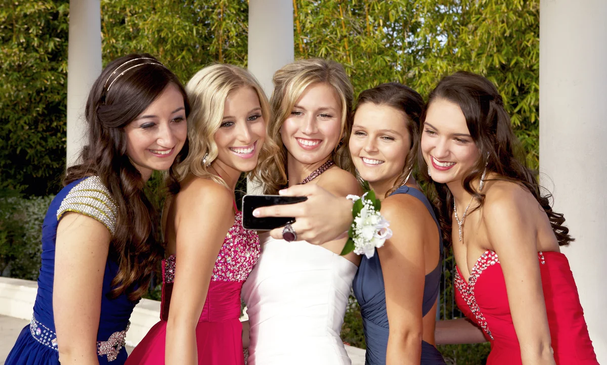 Teenage Prom Girls Taking a Photo with Mobile Phone