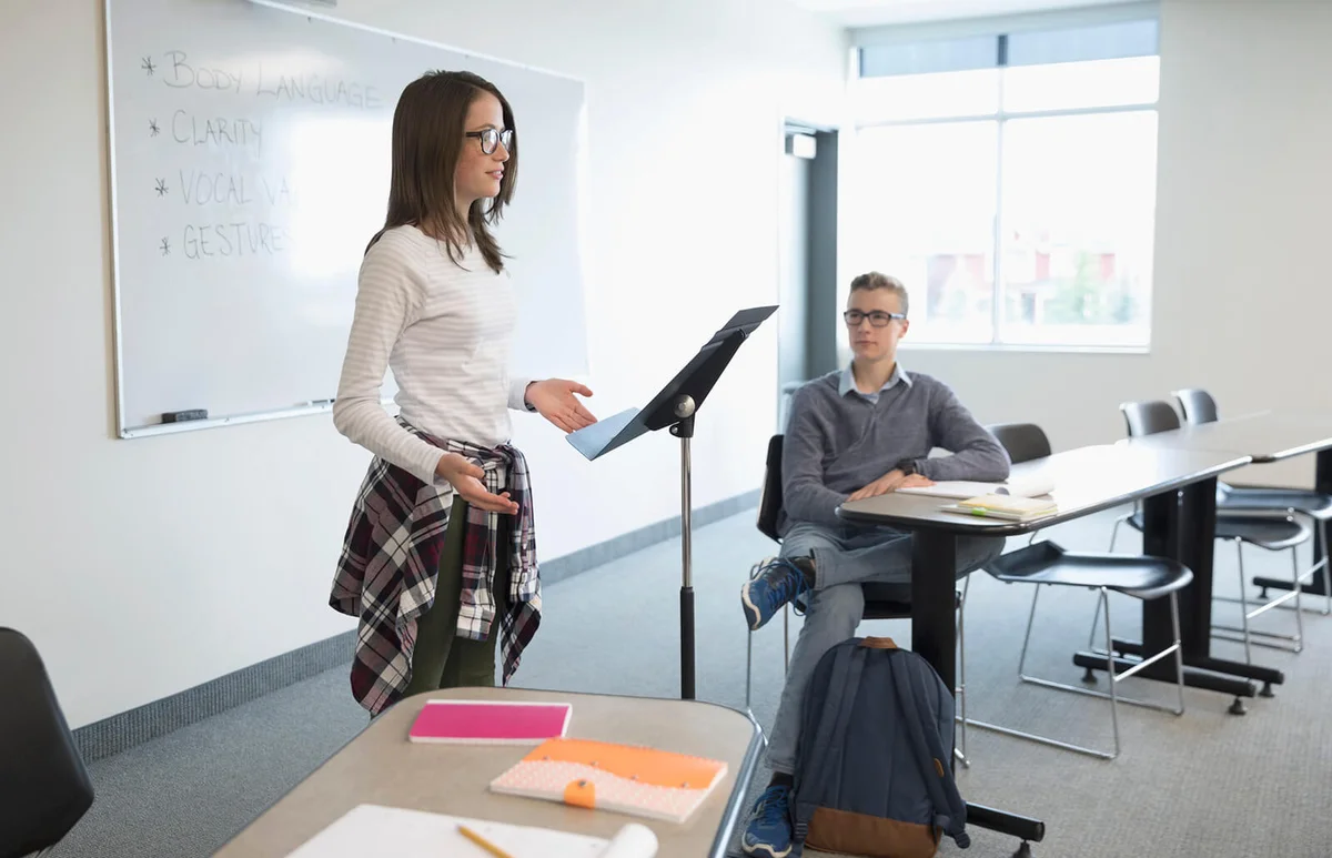 student speaking in debate club