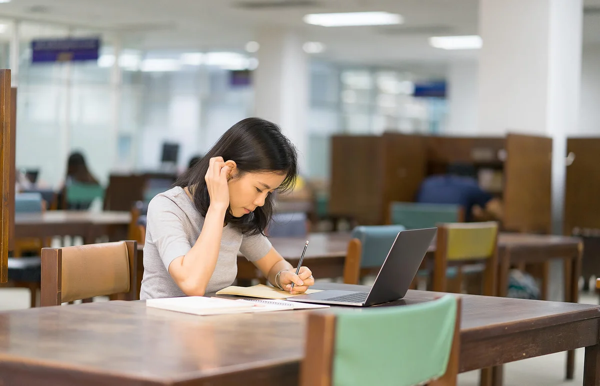 teenager student feeling happy at university